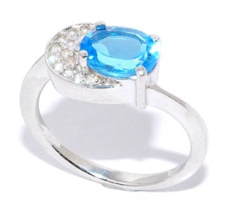 Кольцо серебряное с топазом Swiss Blue и куб. цирконием «Серебряные крылья рассвета» Серебро России (арт.210042)